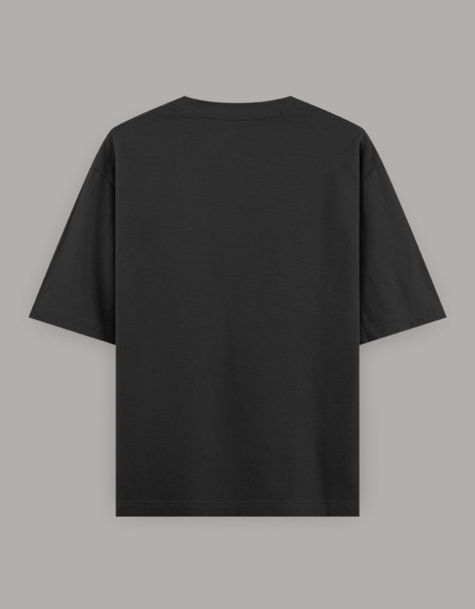 Back of Black ‘Born To Trek’ oversized unisex t-shirt with skull graphic – The Smoky Skull