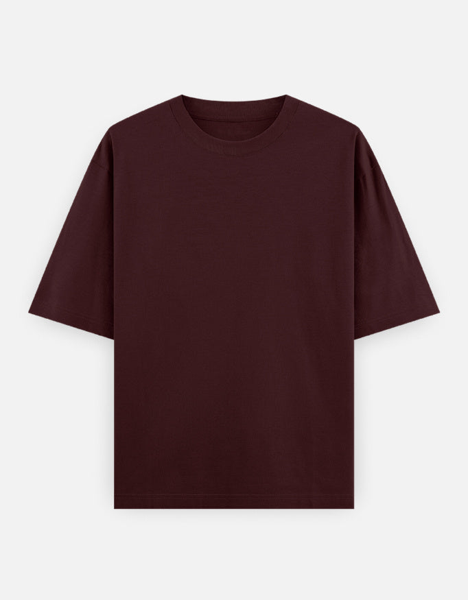 Maroon oversized tshirt with crow holding eyeball graphic and bold Kaga Re Kaga text – The Smoky Skull front view