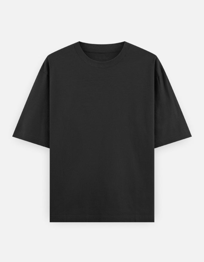 Black oversized tshirt with crow holding eyeball graphic and bold Kaga Re Kaga text – The Smoky Skull front view