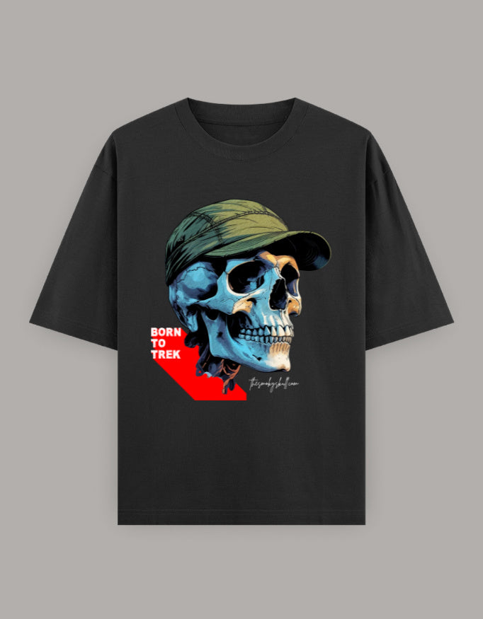 Front of Black ‘Born To Trek’ oversized unisex t-shirt with skull graphic – The Smoky Skull