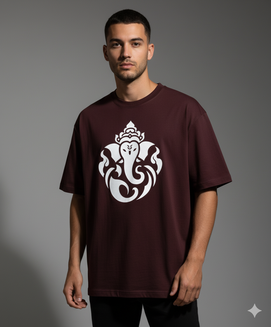 Maroon t-shirt with white Ganesha print worn by a male model in a photoshoot. Smoky Skull