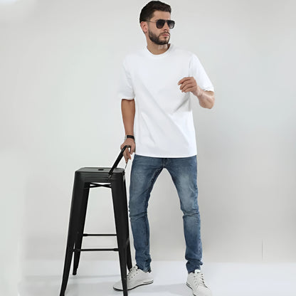 Front view of man wearing plain white oversized t-shirt – The Smoky Skull