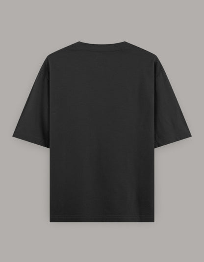 Back of Black ‘Born To Trek’ oversized unisex t-shirt with skull graphic – The Smoky Skull