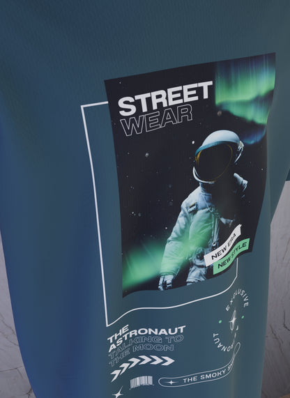Petrol Blue oversized t-shirt with astronaut streetwear graphic and text print – The Smoky Skull front design